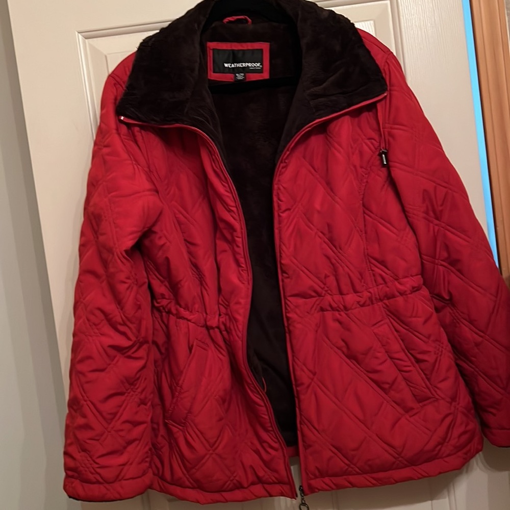 Cozy faux fur lined winter jacket. Excellent condition and a great for fall.